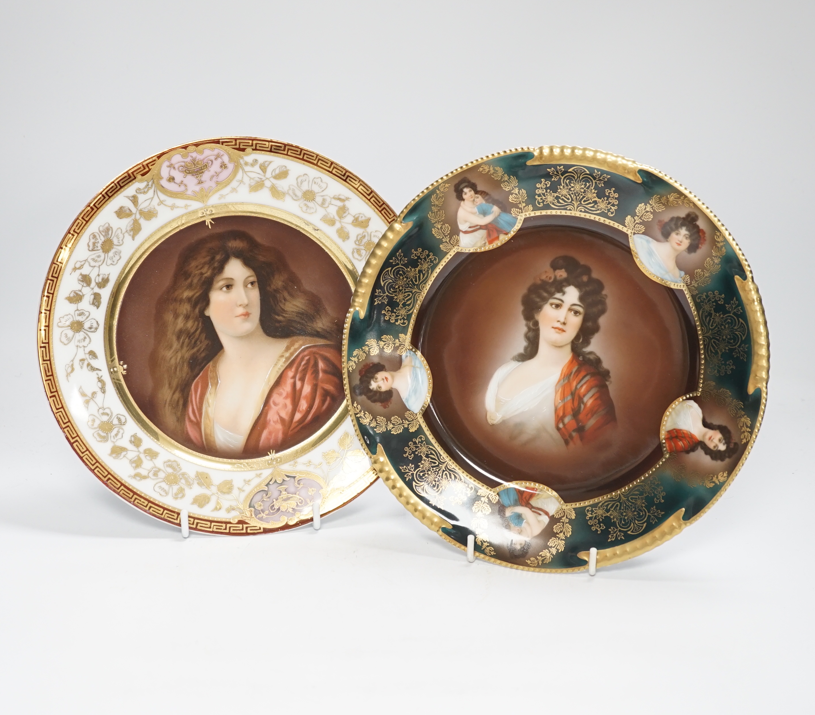 Two early 20th century Vienna style cabinet plates, printed and enamelled with portraits, 24cm diameter